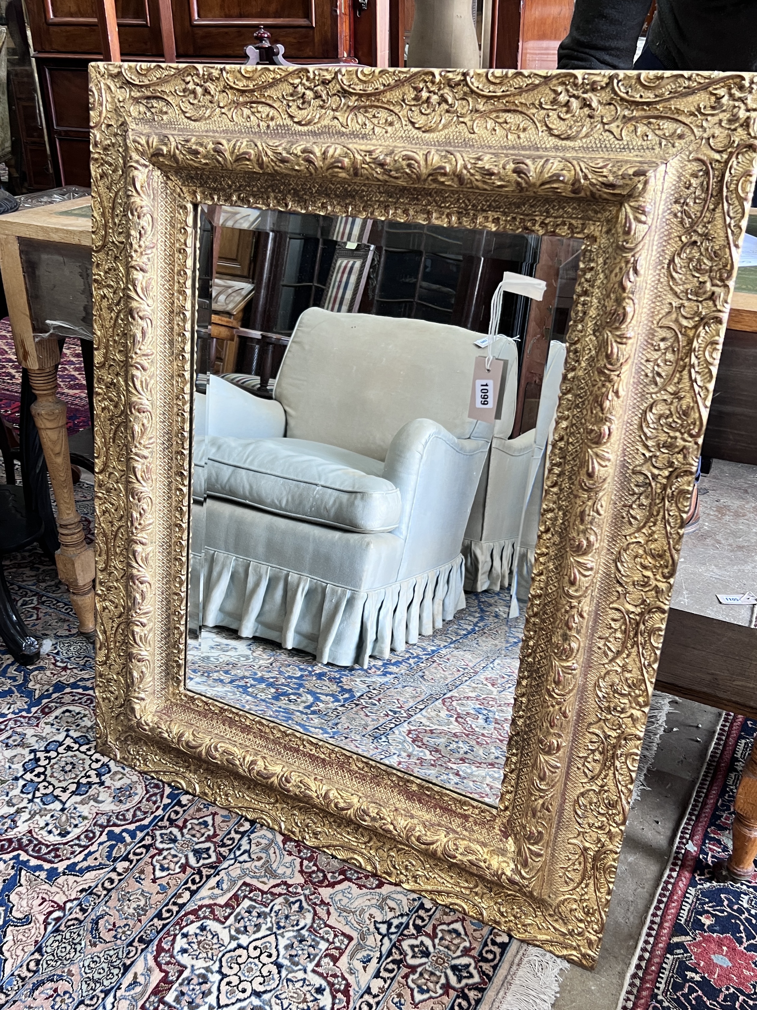 An early 20th century rectangular gilt framed wall mirror width 80cm height 100cm.